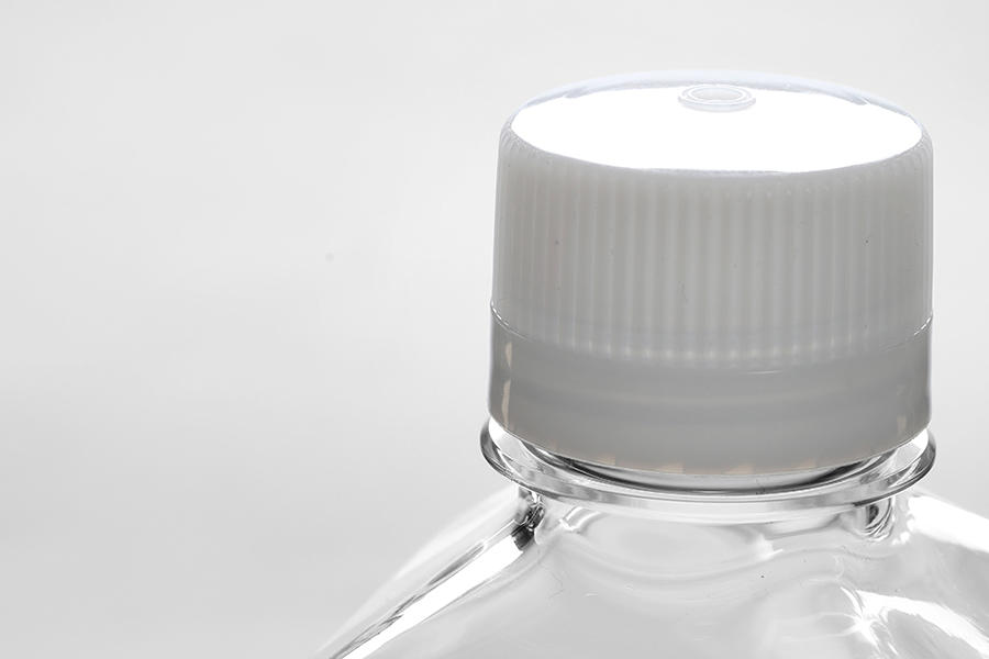 detail of Square media bottle